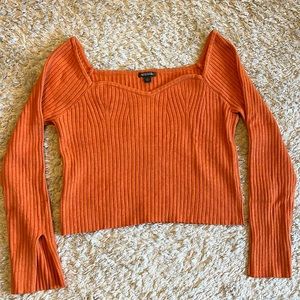 Orange long sleeve crop top